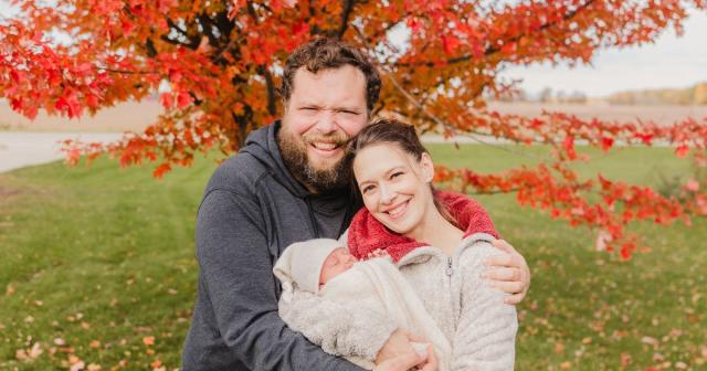 Image of Charles pol with his wife and newborn baby